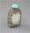 A Chinese pale celadon jade, silver and turquoise and coral mounted snuff bottle, late 19th century, 7.5cm (no. 755)                   