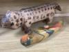 A decorative 20th century Brazilian carved wood dog and a painted carved wood parrot (2)                                                                                                                                    