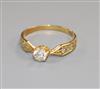 An early 20th century 18ct gold and single stone diamond ring, with diamond set shoulders, size K.                                     