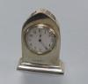 An Edwardian silver mounted lancet miniature timepiece, Birmingham, 1906, 71mm.                                                                                                                                             