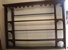 A mid 18th century oak plate rack W.163cm                                                                                              