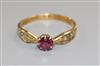 An early 20th century 18ct gold, single stone ruby ring, with diamond set shoulders, size K.                                           