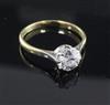 A 1980's 18ct gold and solitaire diamond ring, size R.                                                                                 