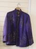 A Chinese purple brocade silk quilted jacket, length 71cm                                                                                                                                                                   