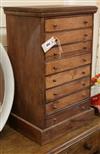 A pine nest of eight small drawers W.37cm                                                                                              