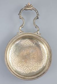 A George III silver single handled lemon strainer, London, 1779,                                                                       