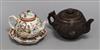 An 18th century Chinese Export famille rose teapot, cover and a similar dish                                                           