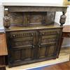 A 17th century style oak court cupboard W.138cm.                                                                                       