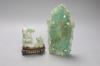 A Chinese jadeite carving of a Luohan and a green quartz vase and cover, 20cm (2)                                                                                                                                           