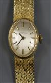 A lady's 18ct gold Certina manual wind wrist watch, on 18ct gold bracelet.                                                             