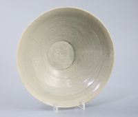 A Chinese celadon bowl, Song-Yuan dynasty 18.2cm diameter                                                                              