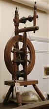 A Victorian beech spinning wheel W.44cm                                                                                                