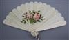 A late 19th century ivory fan painted with pink roses 23cm long                                                                        