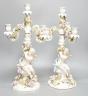 A pair of Sitzendorf 'cherub' candelabra 50cm                                                                                                                                                                               