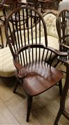 A Windsor style stick back kitchen elbow chair                                                                                         