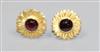 A pair of 18ct gold and garnet flower head ear clips, stamped, G. Dalgleish, 18mm.                                                     