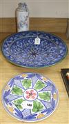 A Moroccan pottery wall charger, a Coimbra faience bottle vase and a modern Manises ceramic wall plate,                                