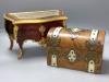 A tortoiseshell and ormolu jewellery casket, modelled in the form of a French commode and a Victorian brass-mounted walnut tea caddy, largest 31cm                                                                          