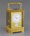 A late 19th century French ormolu hour repeating giant carriage clock, with alarm, height 7in.                                         