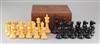 A Jaques & Son Staunton boxwood and ebony chess set, kings 4.25in., board 22 x 21.75in.                                                