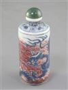 A Chinese underglaze blue and copper red 'dragon' cylindrical snuff bottle, 19th century, height 8cm excl. stopper                     