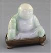 A Chinese jadeite seated figure of Budai, height 6.2cm, wood stand                                                                     