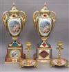 A pair of Austrian style lidded urns and a pair of gilt and ceramic candlesticks urns height 41cm                                      