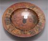 A large circular patinated copper dish, impressed 'S.F.' to foot rim, diameter 44.5cm                                                  