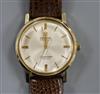 A gentleman's gold plated Omega Seamaster De Ville automatic mid-size wrist watch.                                                     