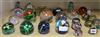 A collection of glass paperweights                                                                                                     