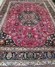 A Heriz red ground floral carpet, 400 x 298cm                                                                                                                                                                               