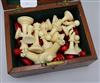 A Staunton ivory chess set, early 20th century, red stained and natural, mahogany box                                                  