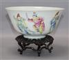 A Chinese famille rose bowl, Qianlong mark but early 20th century diameter 17.5cm, wood stand                                          