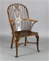 An early 19th century yew, ash and elm Windsor chair, W.2ft D.1ft 9in. H.3ft 5in.                                                      