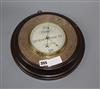 A Negretti & Zambra plate mounted oak aneroid barometer                                                                                