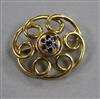 A sapphire set gold scroll brooch 3.5cm, gross 8.9grams                                                                                