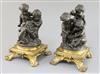 After Paul Emile Machault (1800-1866). A pair of 19th century bronze groups of putti playing dice and weeping, height 10in.            