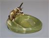 A cold plated bronze model of a dog and a green onyx ashtray                                                                           