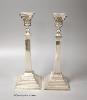 A pair of George V silver candlesticks, Britton, Gould & Co, Birmingham, 1934, 28.4cm, 20.5 oz, lacking sconces.                                                                                                            