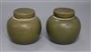 A pair of Chinese teadust glazed small jars and covers, early 20th century, 8cm high                                                   