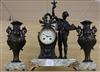 A late 19th century French bronzed spelter figural three piece clock garniture, on marble plinths height 40cm                          