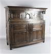 A 17th century oak court cupboard, W.5ft 8in. D.1ft 11in. H.5ft 1in.                                                                   