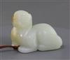 A Chinese white jade figure of a recumbent lion-dog, possibly 18th century, 5.9cm                                                      