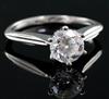 A modern 18ct white gold and solitaire diamond ring, the stone weighing approximately 1.00ct, size I, gross 2.6 grams,                 