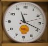 A Smith's 'Shell' advertising wall clock, 32 cms diameter.                                                                                                                                                                  