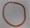 A single strand graduated coral bead necklace, 48cm.                                                                                   