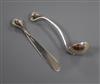 A modern silver ladle and latter opener by Sara Jones, London, 1994 & 1996, both with swan head terminals, largest 12cm.               