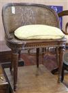 A French carved tub chair                                                                                                              