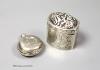 A 19th century Dutch white metal pill box, 42mm and a base metal sovereign case.                                                                                                                                            