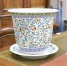 A 20th century Chinese porcelain jardiniere and dish, diameter 36 cms.                                                                                                                                                      